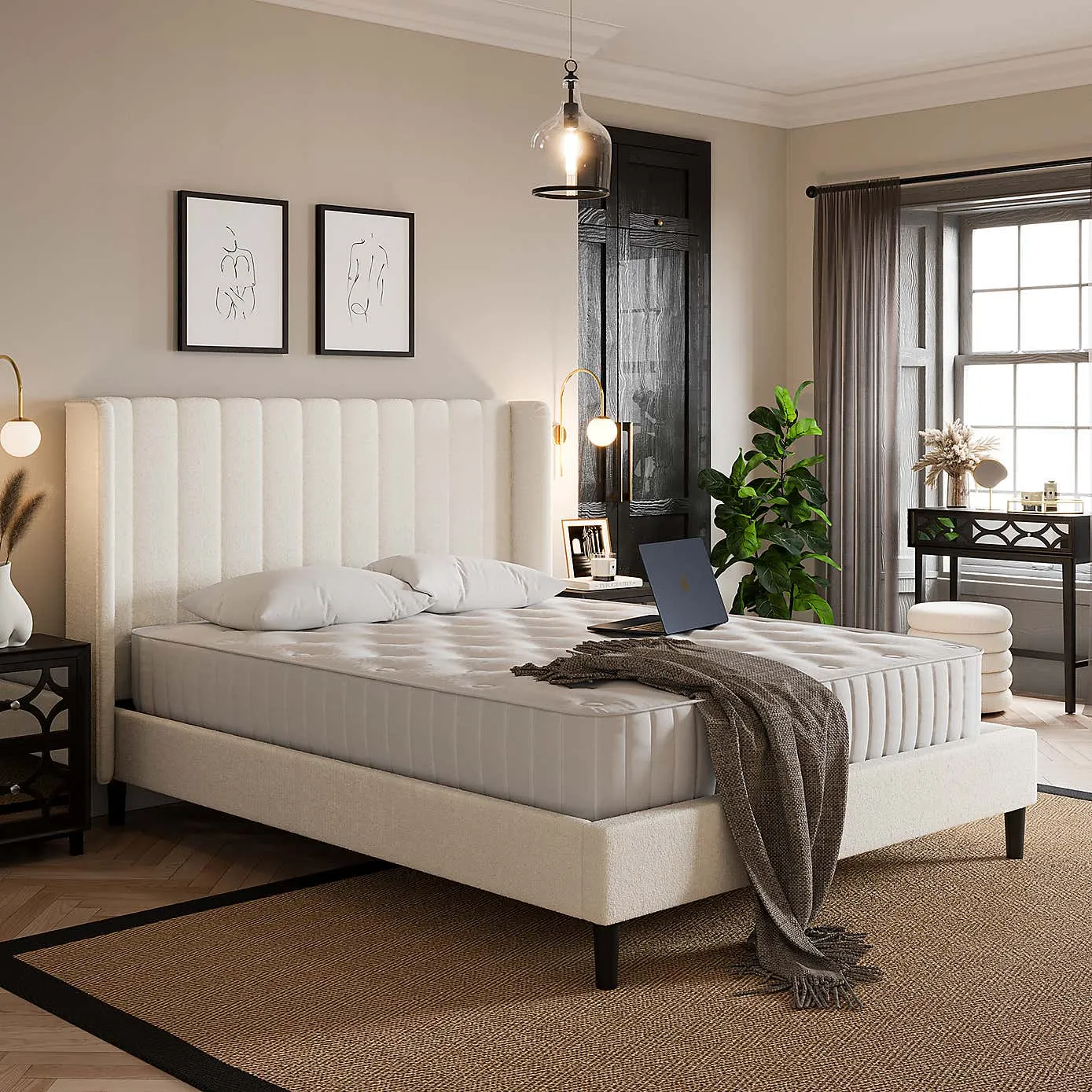 Cream fabric upholstered bed frame with large fluted and winged headboard