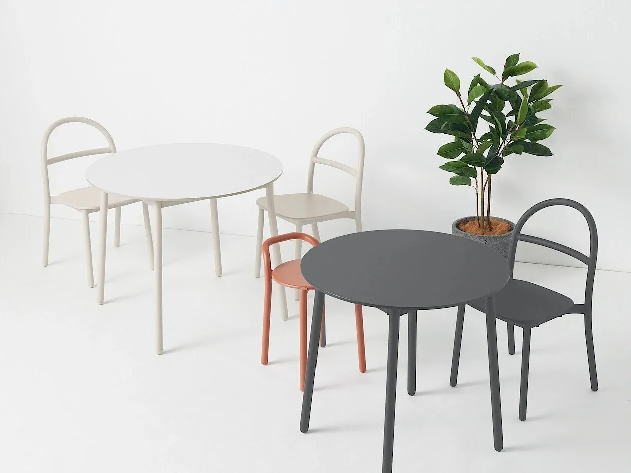 Round metal dining tables with matching chairs