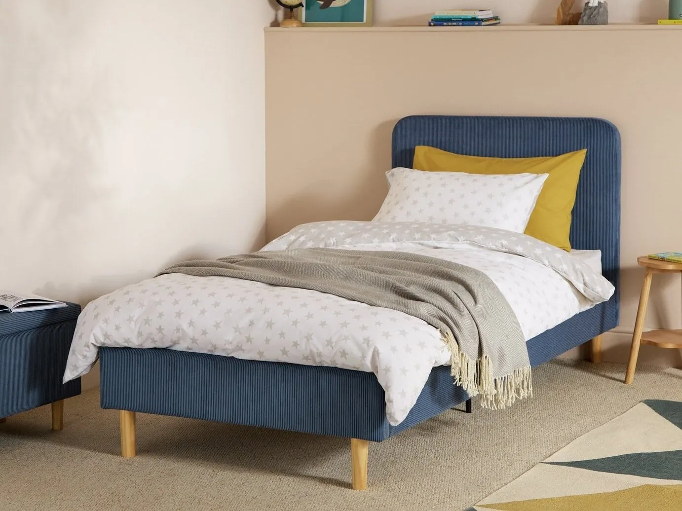 Blue fabric upholstered bed frame