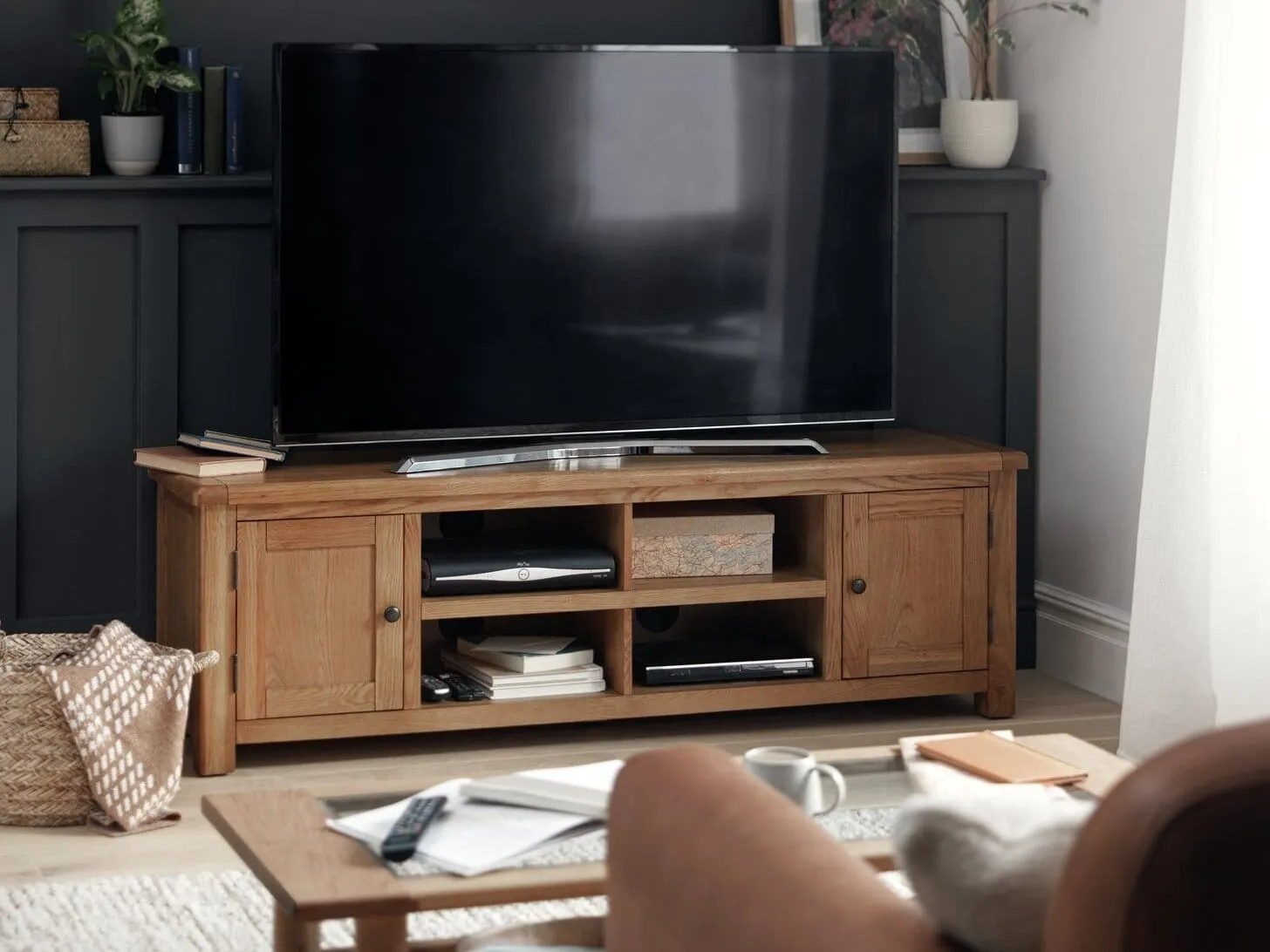 Wide oak tv unit with 2 doors and 4 open shelves