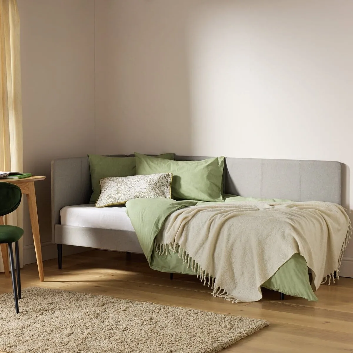 Grey fabric single day bed