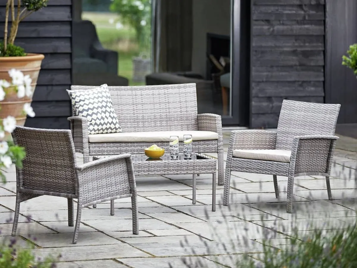 Outdoor rattan set with a sofa, 2 chairs and glass-topped coffee table