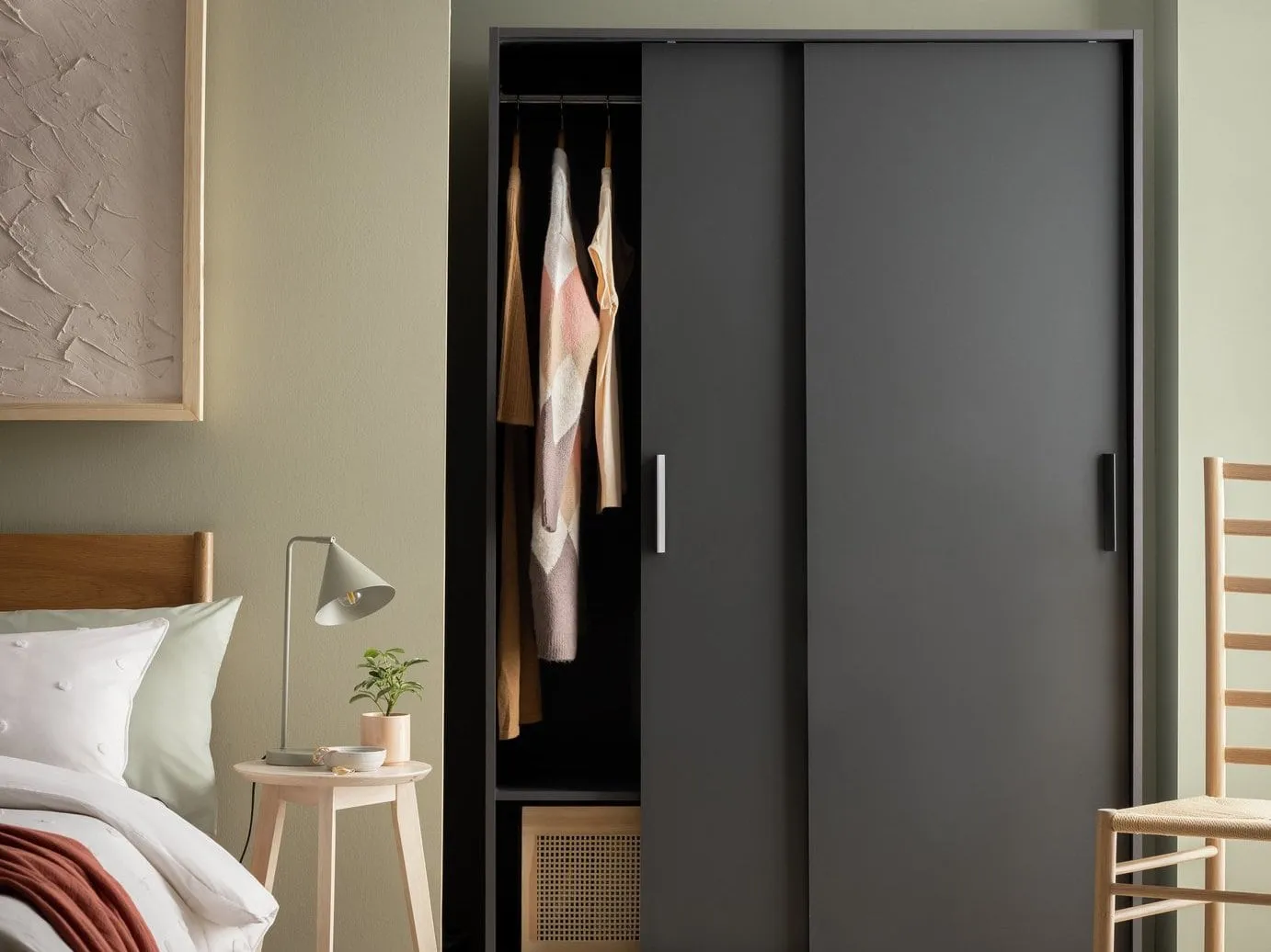 Sliding door wardrobe with a dark grey finish