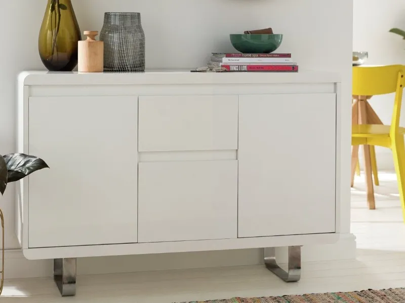 White-gloss finish sideboard mounted on sleigh-style metal legs