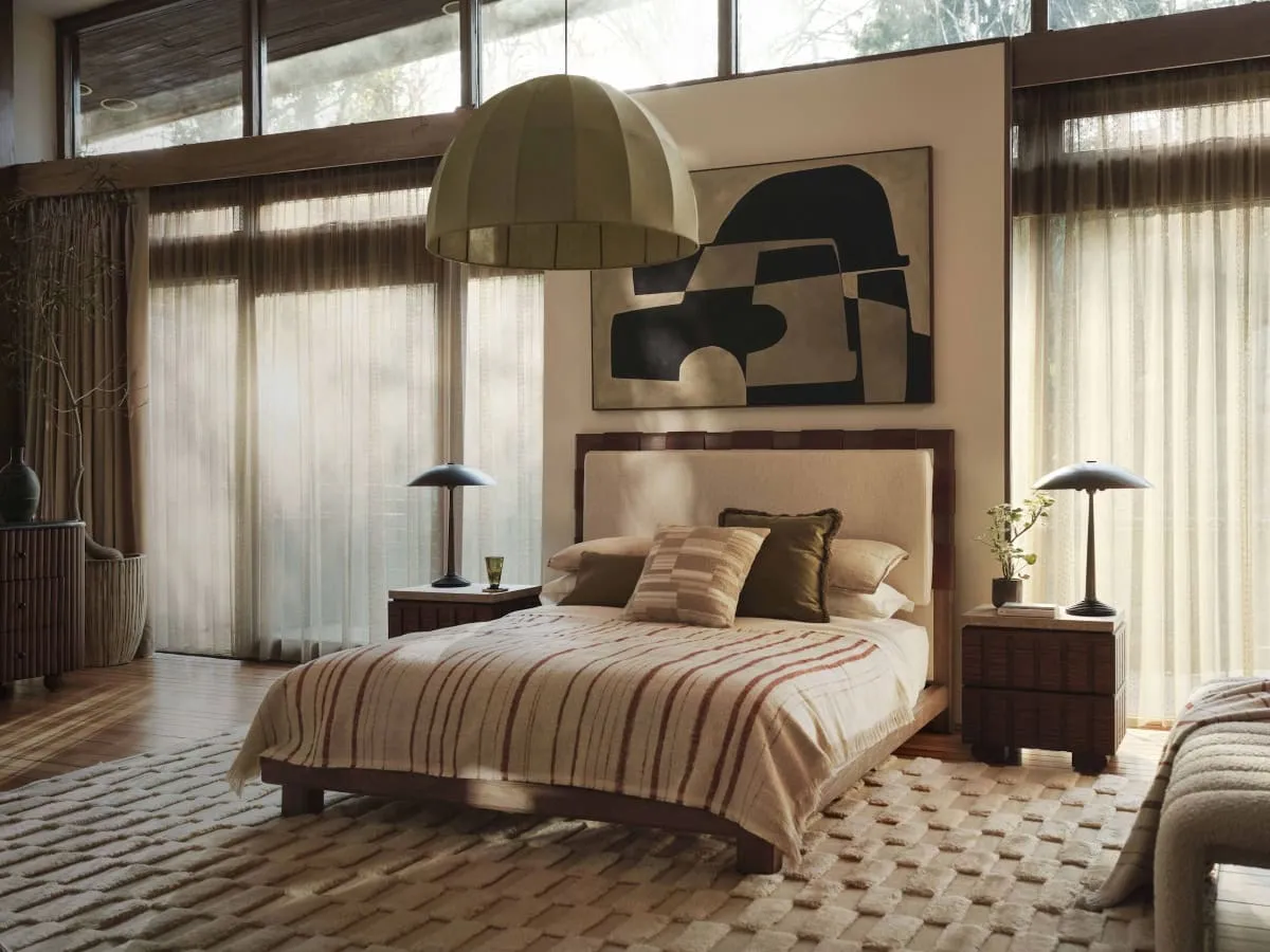Ash wood bed frame with leather detailing