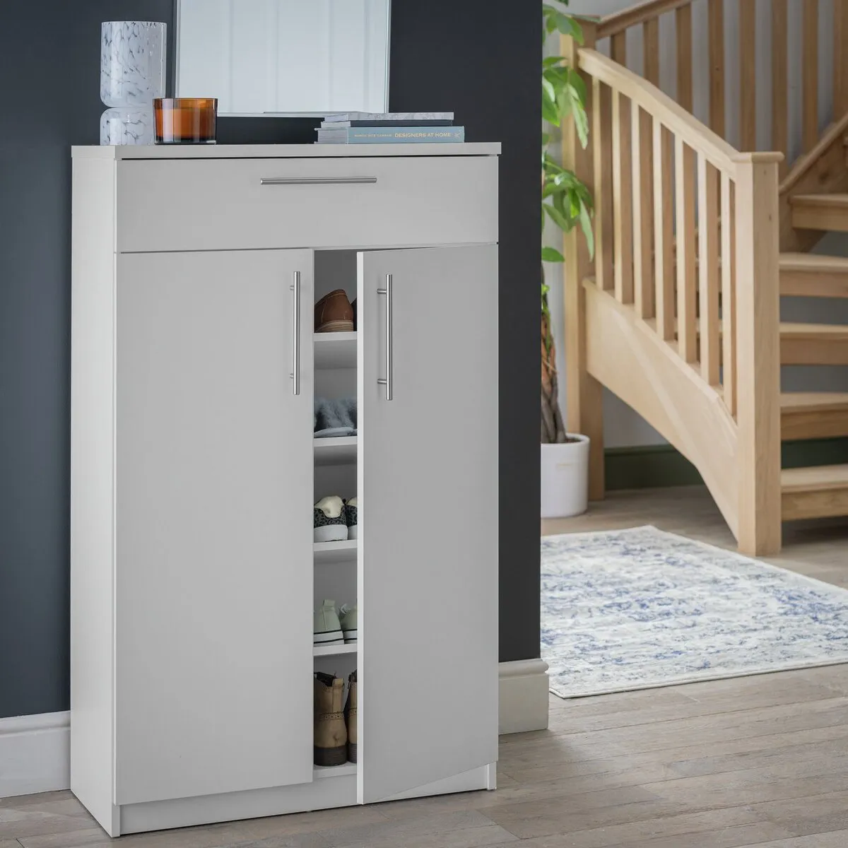 Grey show cupboard with internal shelving and drawer