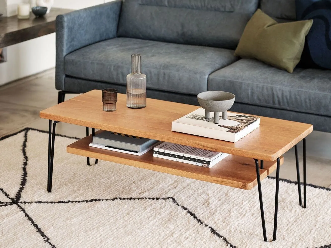 Oak coffee table with black hairpin legs and lower shelf