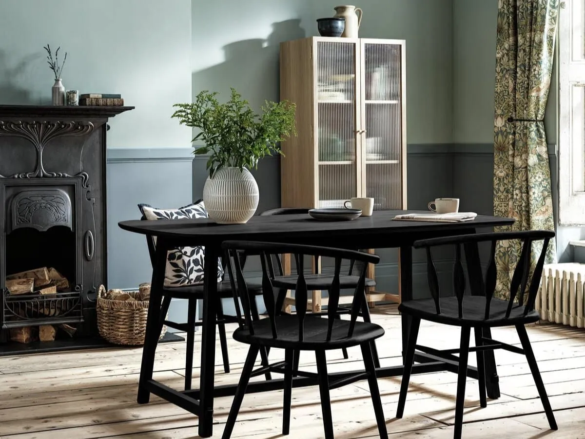 Black dining table and 4 black curved back dining chairs