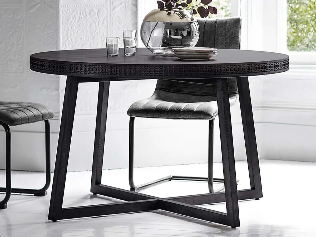 Black mango wood dining table with decorative carved edge