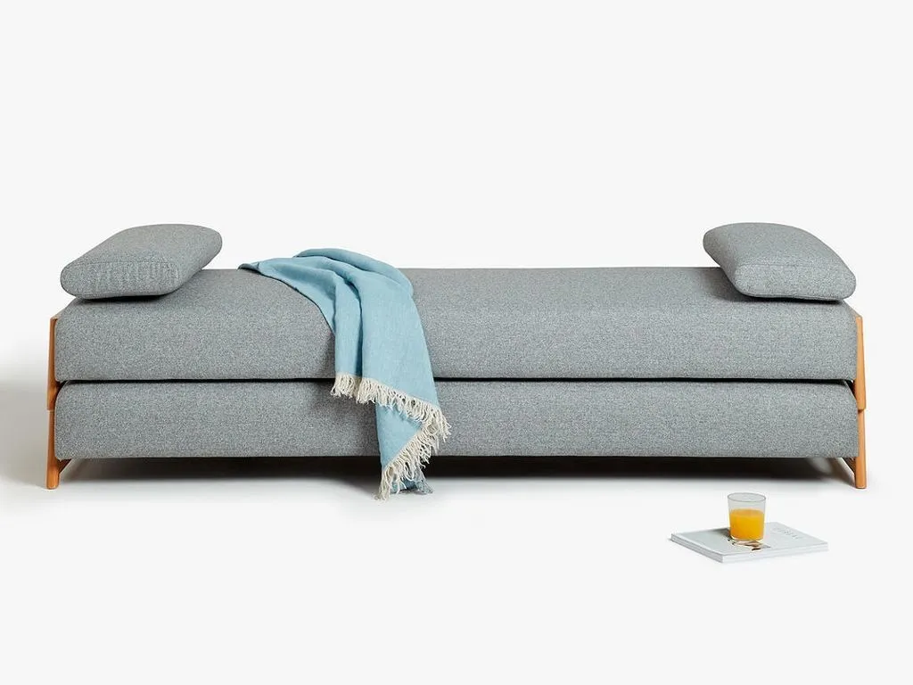Grey fabric day bed as a sofa