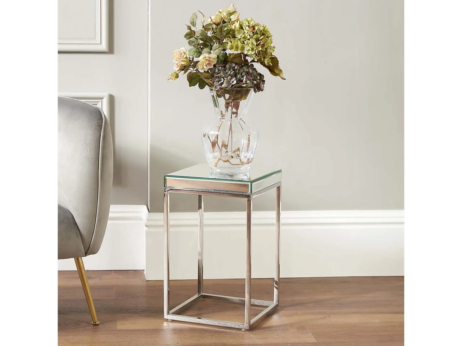 Metal frame side table with mirrored glass top