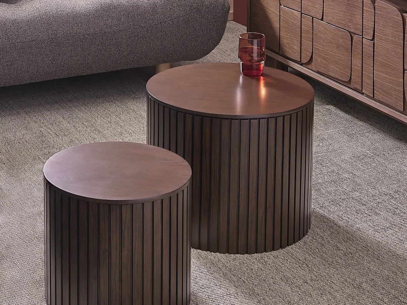 Pair of round walnut tables