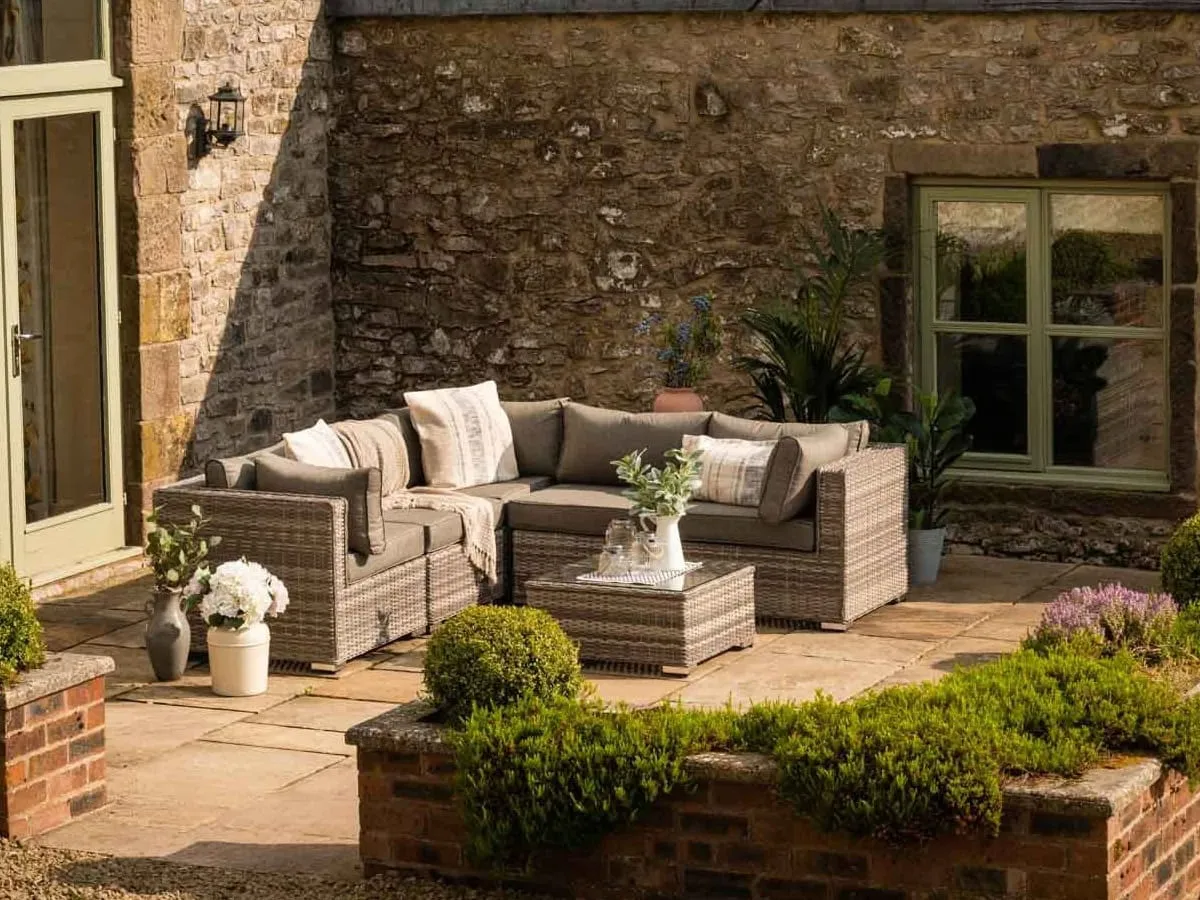 Outdoor rattan corner sofa and matching table
