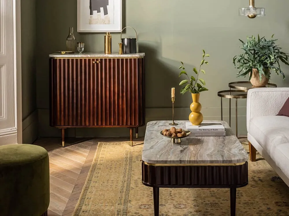 Drinks cabinet with fluted wooden doors and marble top