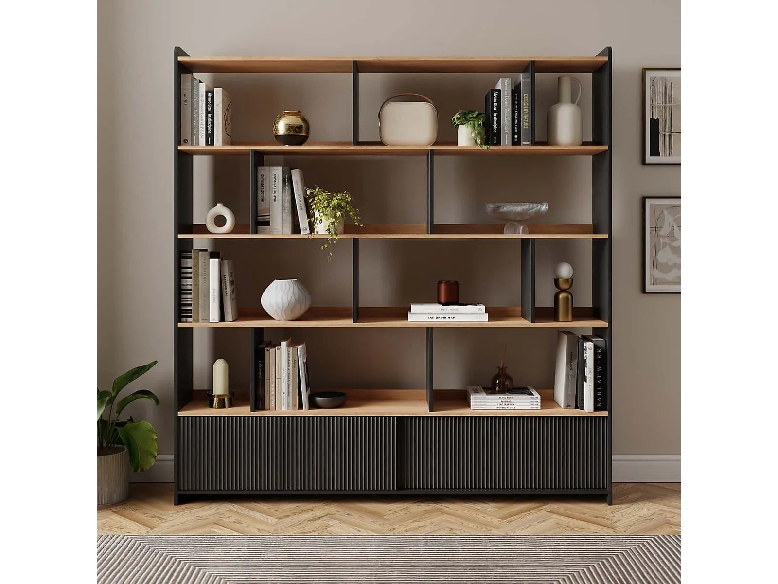 Wide black bookcase with split shelving spaces