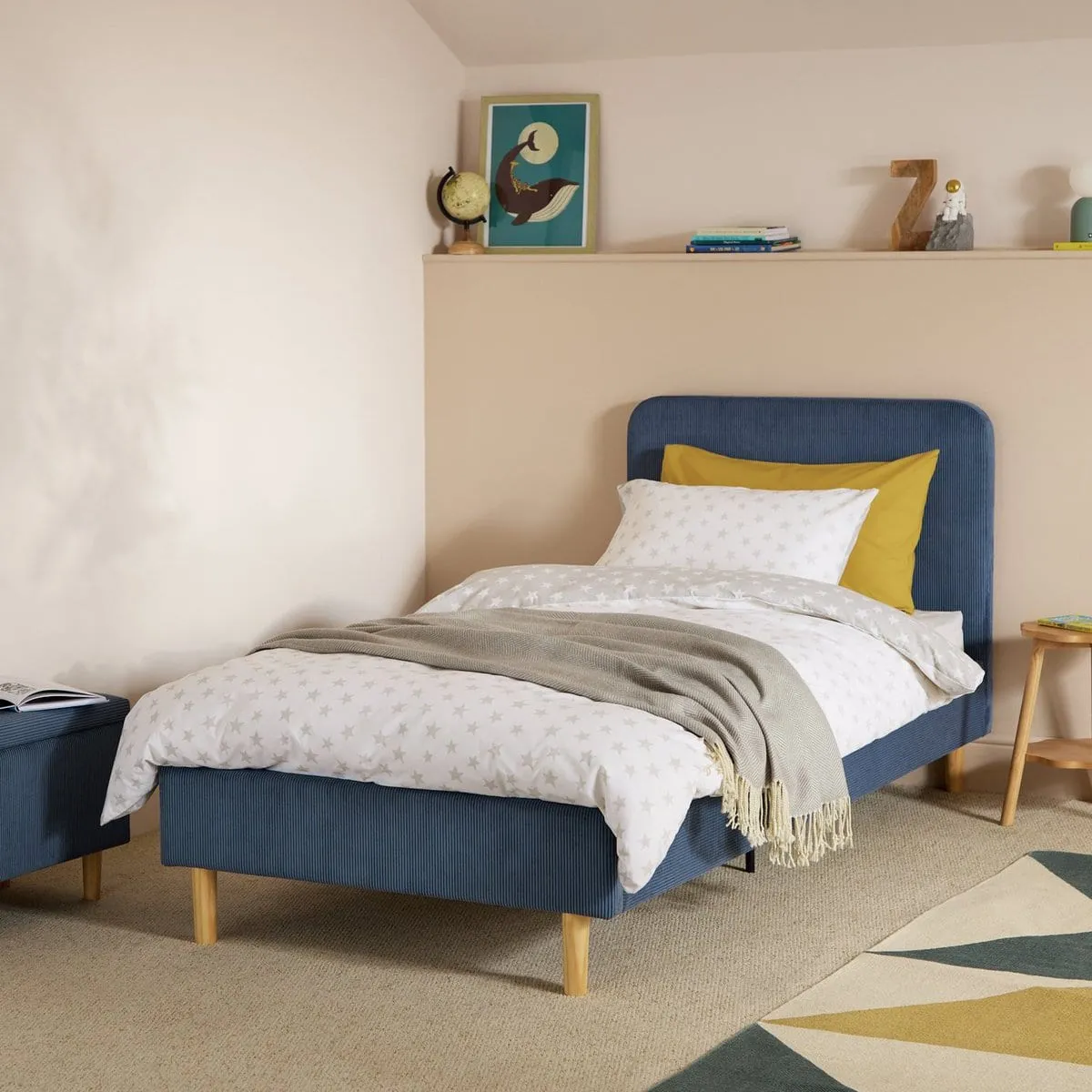 Navy cord fabric upholstered single bed frame with wooden legs