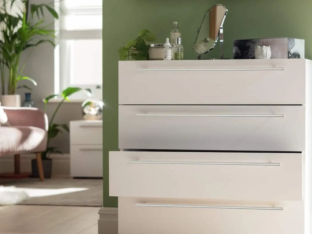 Modern white drawer unit with bar handles