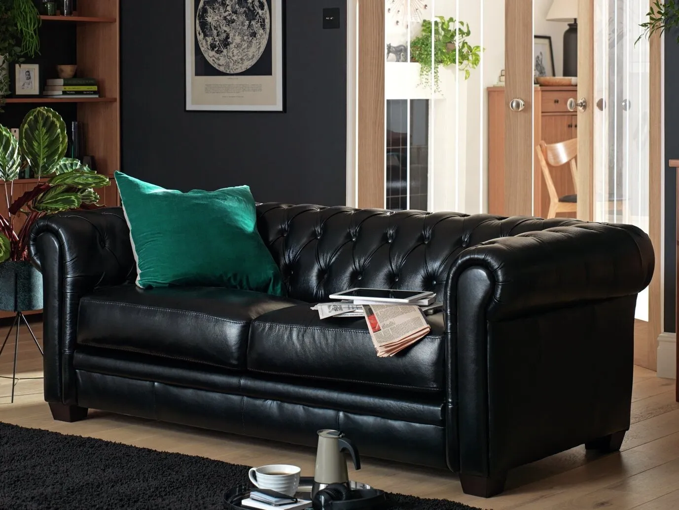 3-seater black leather Chesterfield