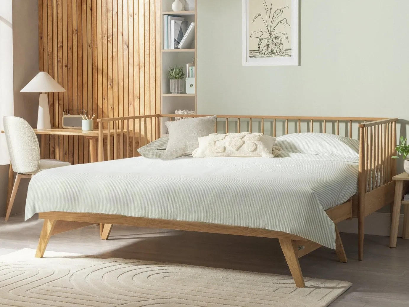 Oak spindle day bed with pull-out guest bed