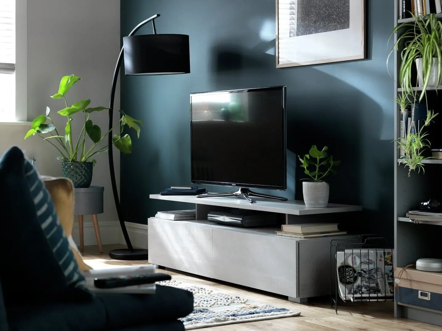 White tv unit with height adjustable top