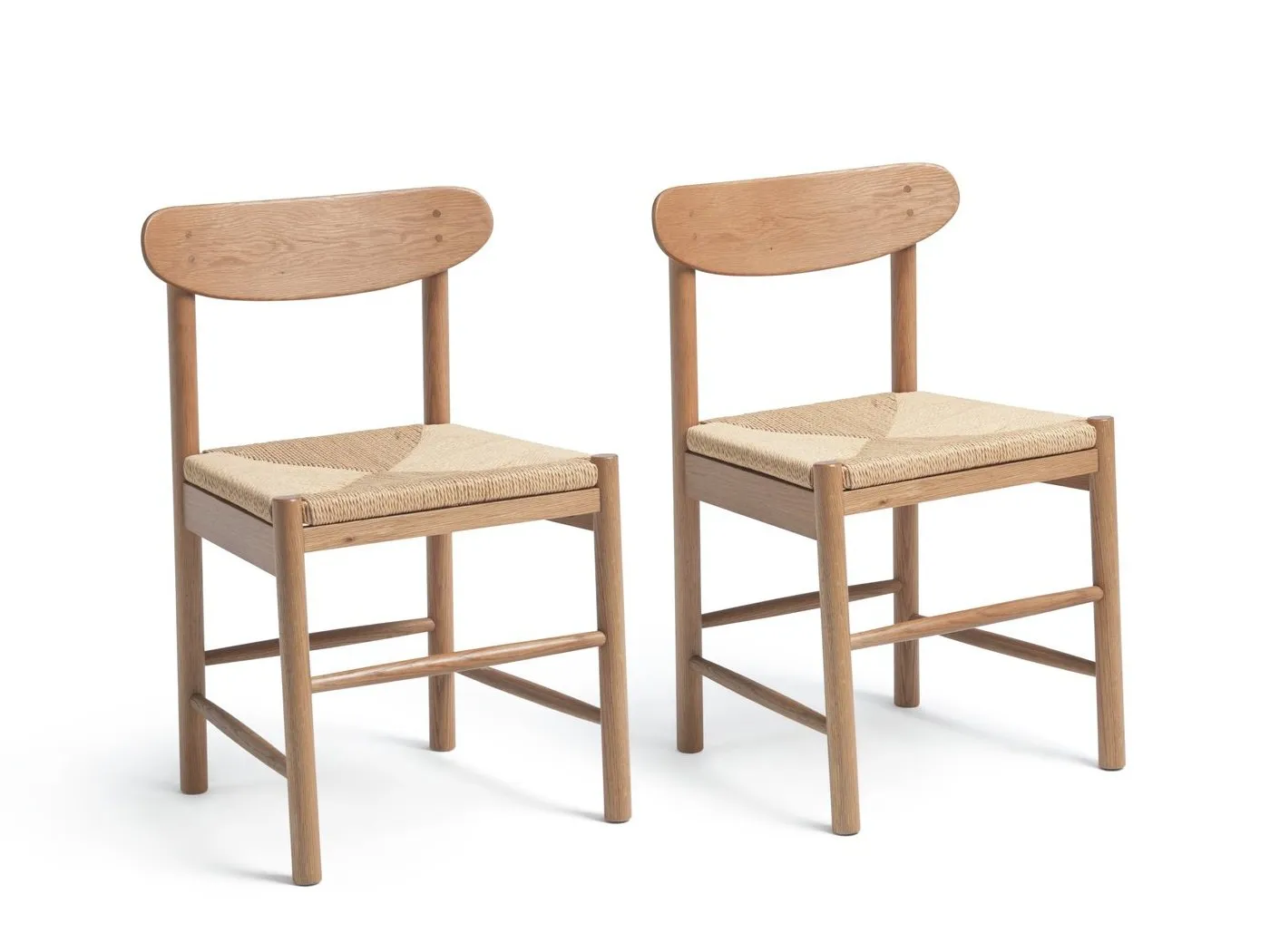 Oak dining chairs with woven seat pads