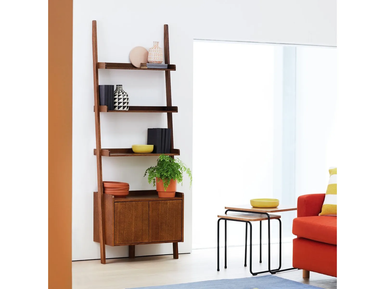 Walnut ladder shelf with 2-door cupboard in base