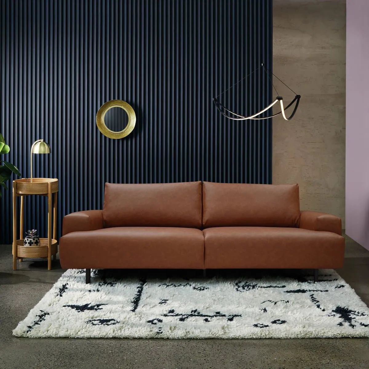 Tan faux leather sofa