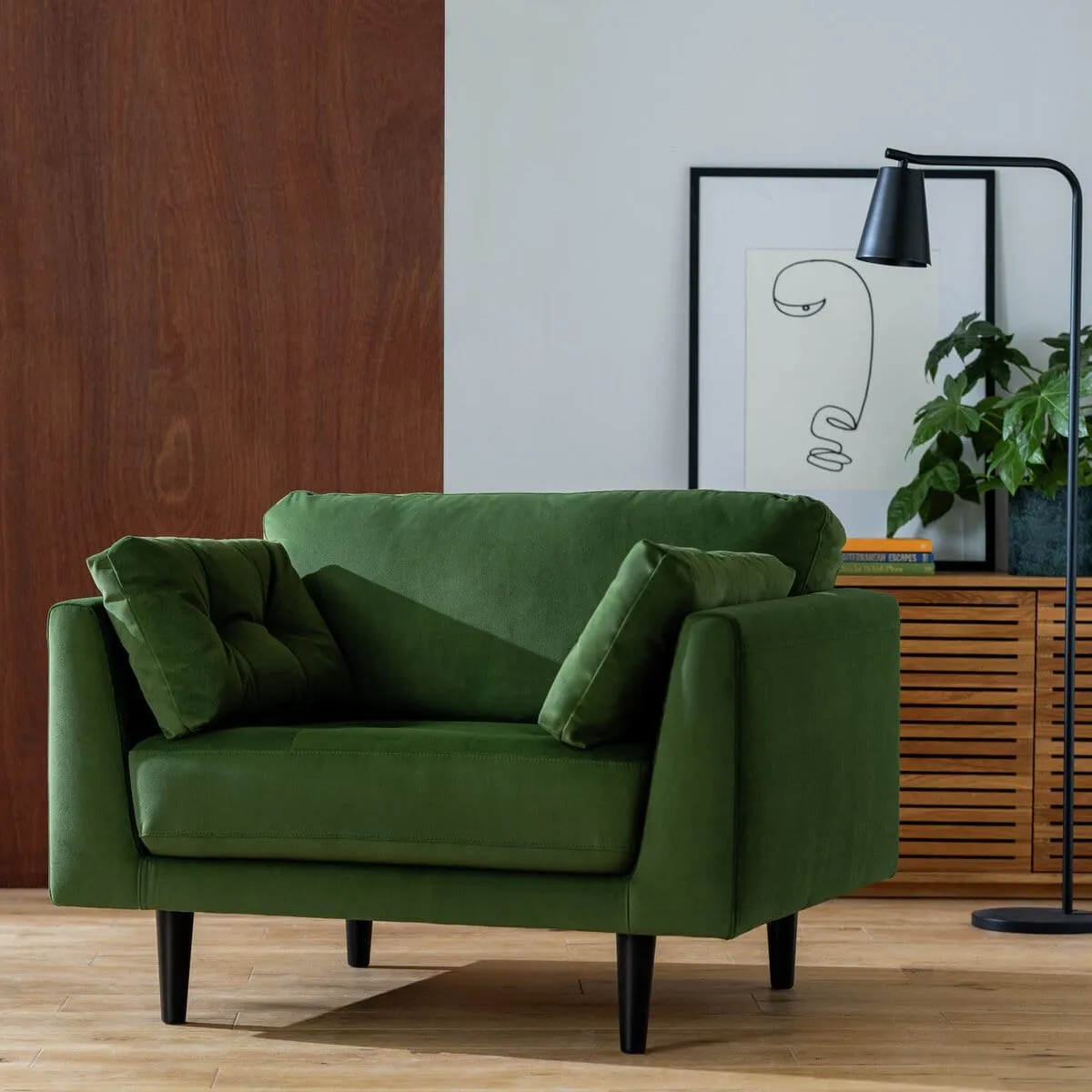 Green fabric cuddle chair