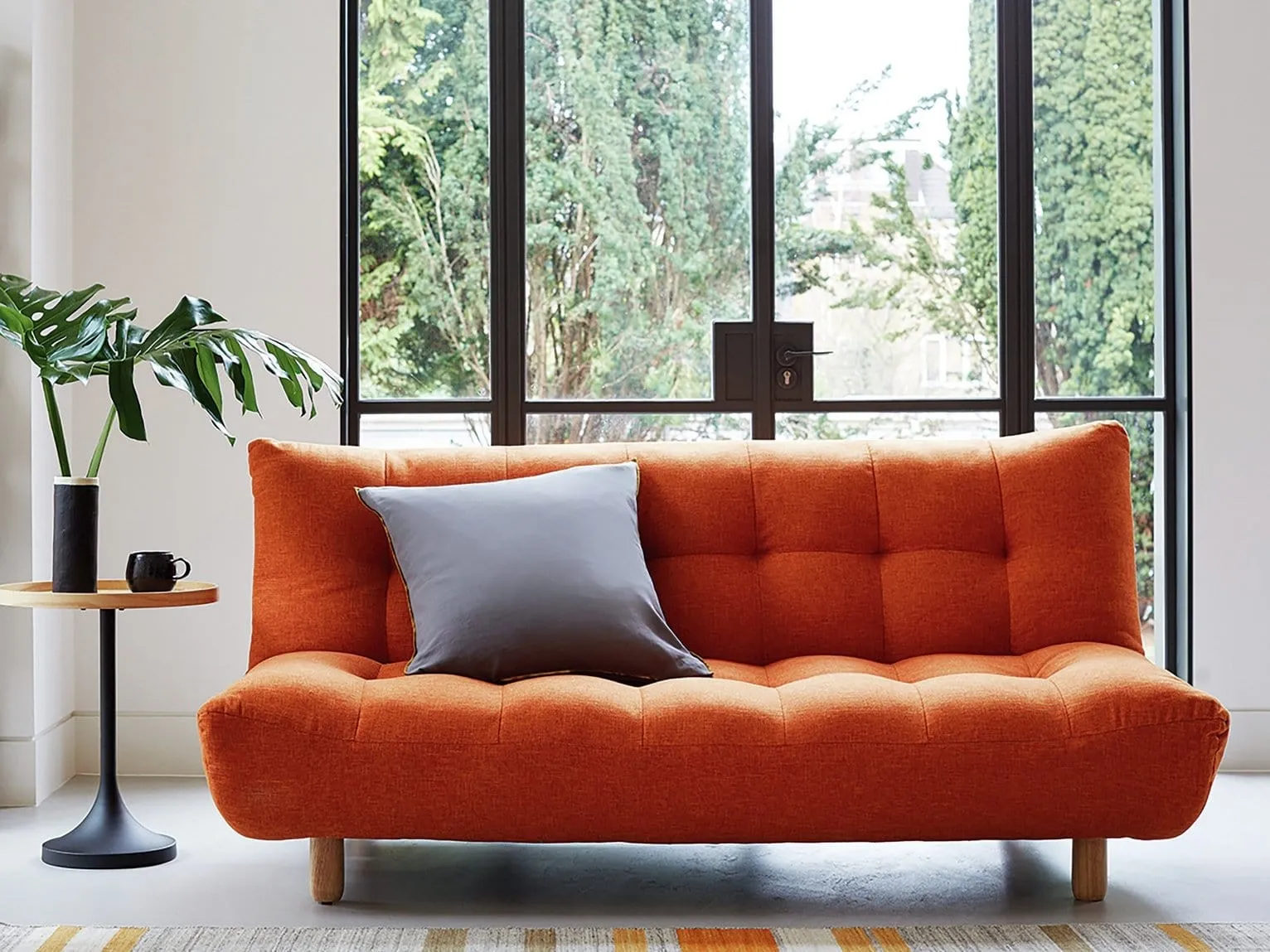 Orange fabric sofa bed