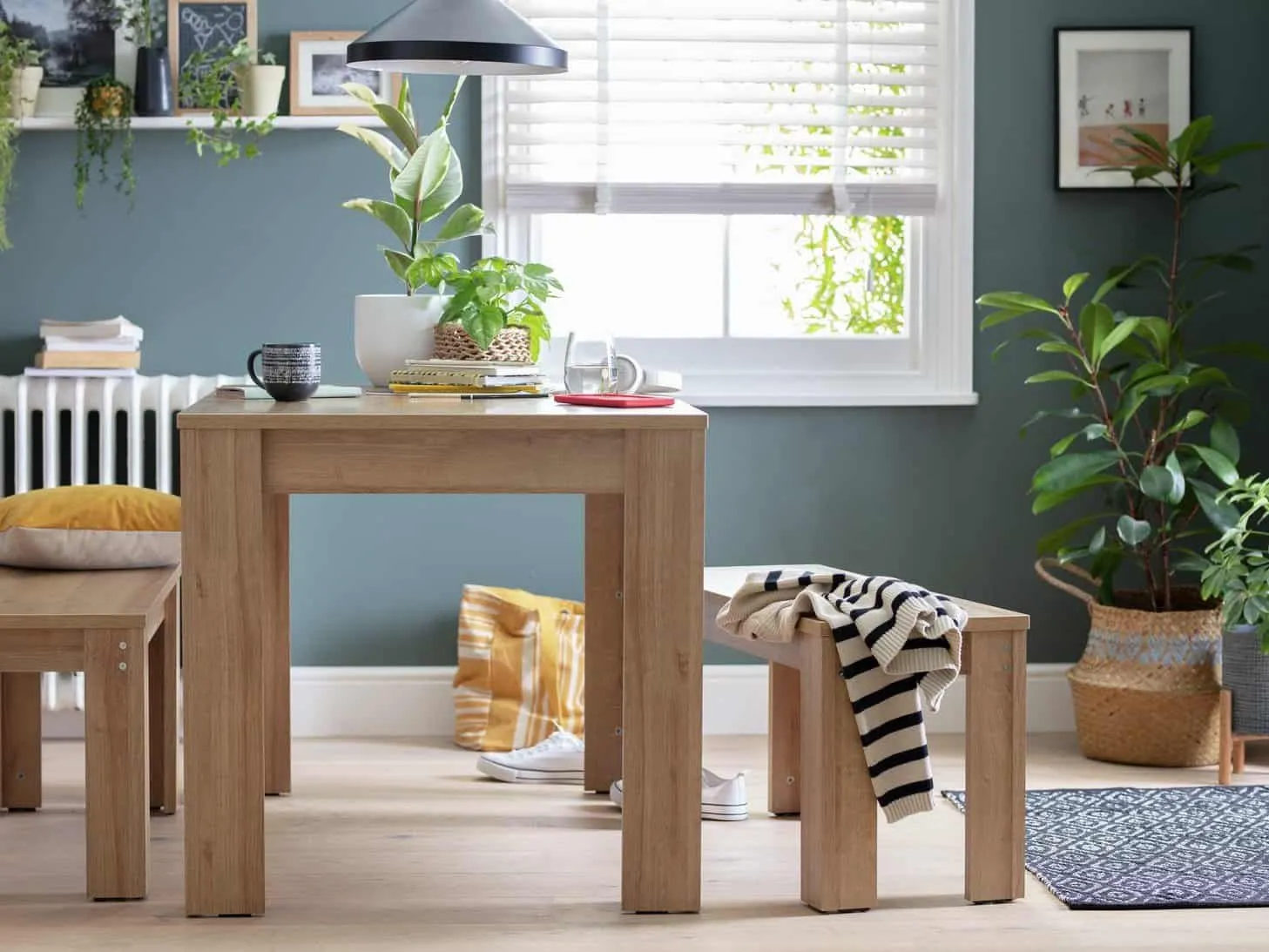 Oak effect dining table and two matching benches