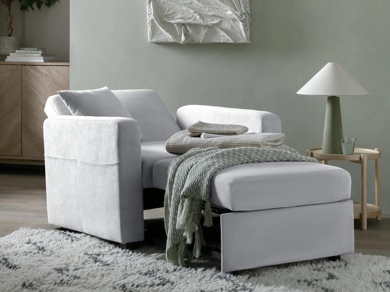 Grey fabric chair bed