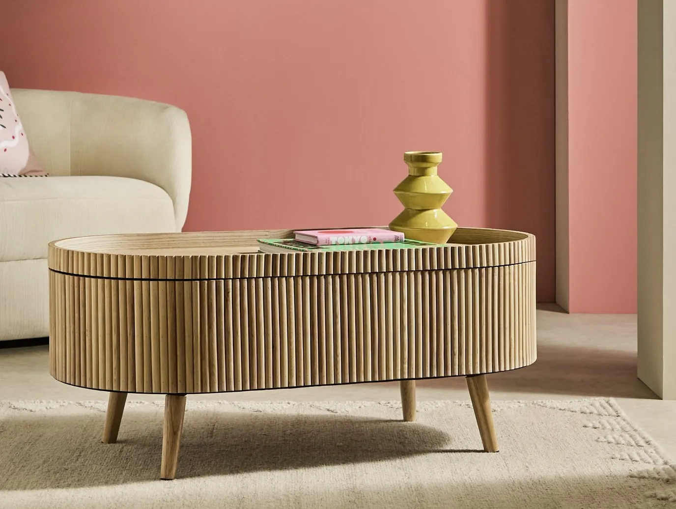 Oval coffee table with slatted finish