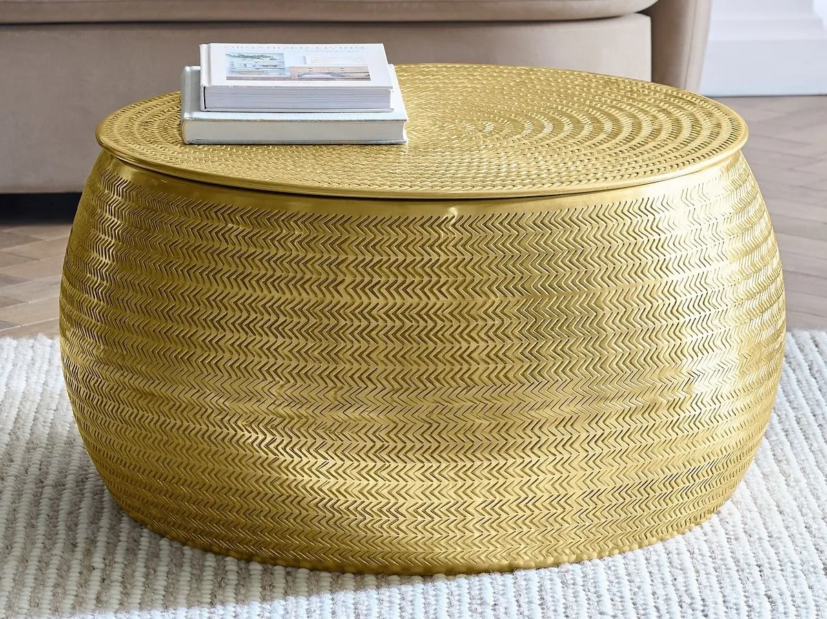 Round brass coffee table