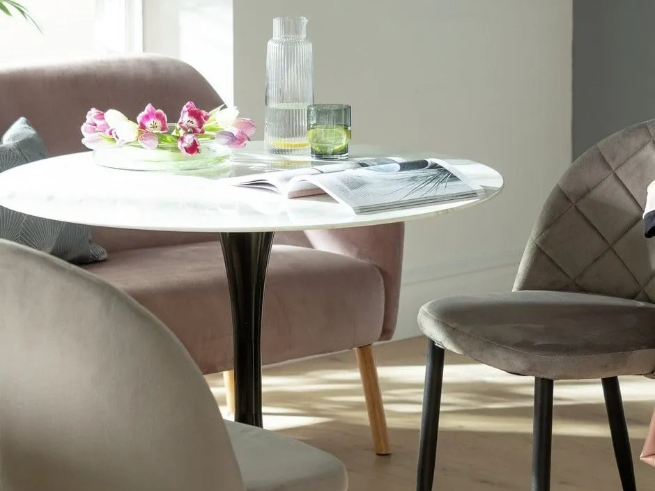 Marble effect round dining table with black stem base