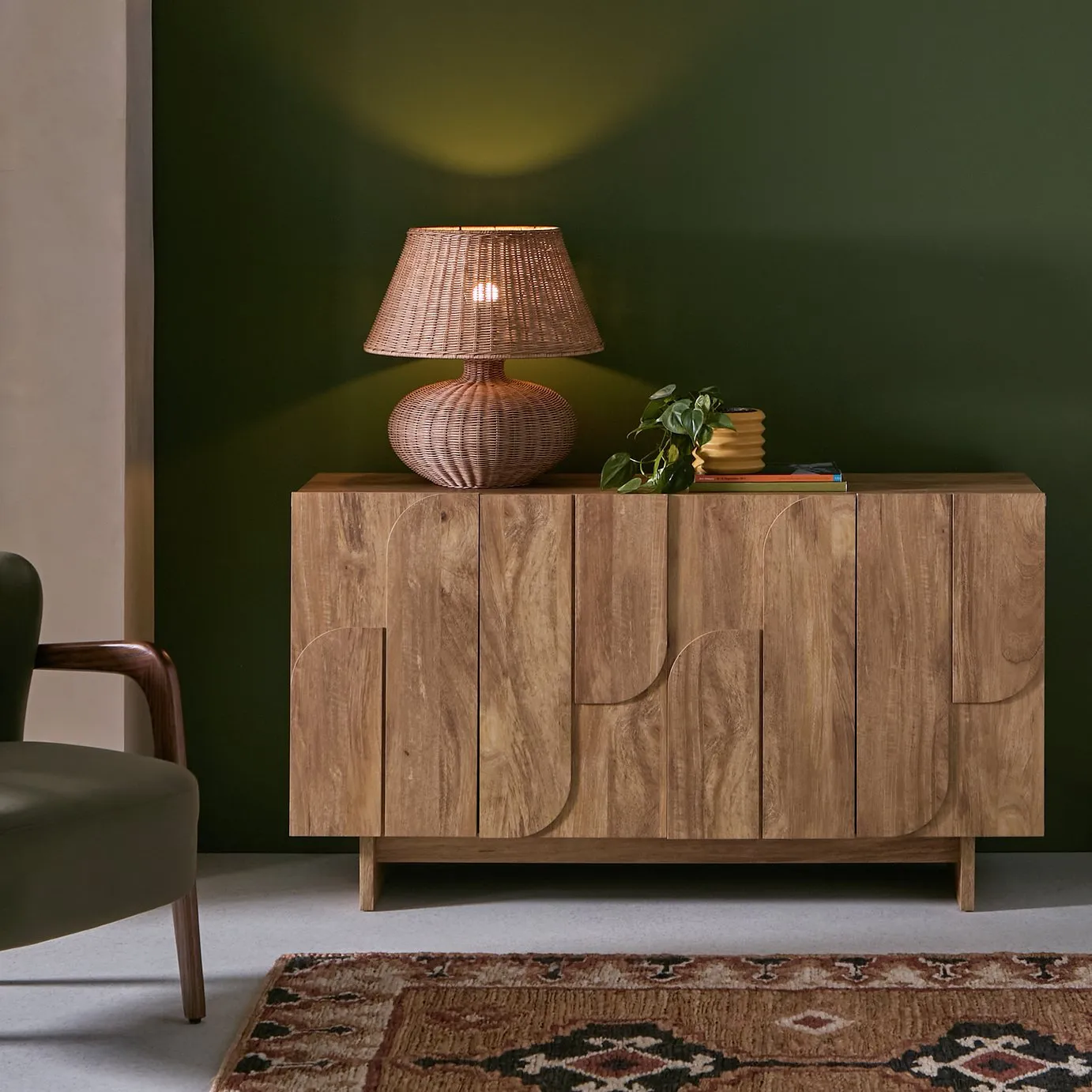 Oak sideboard with carved pattern doors