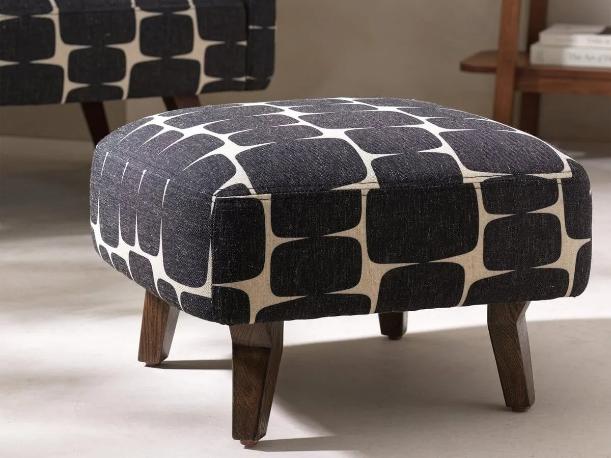Bold pattern fabric upholstered footstool