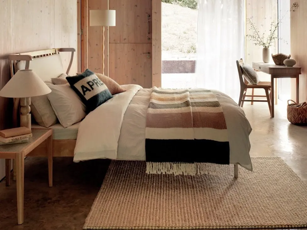 Light oak bed frame with slatted and cushioned headboard