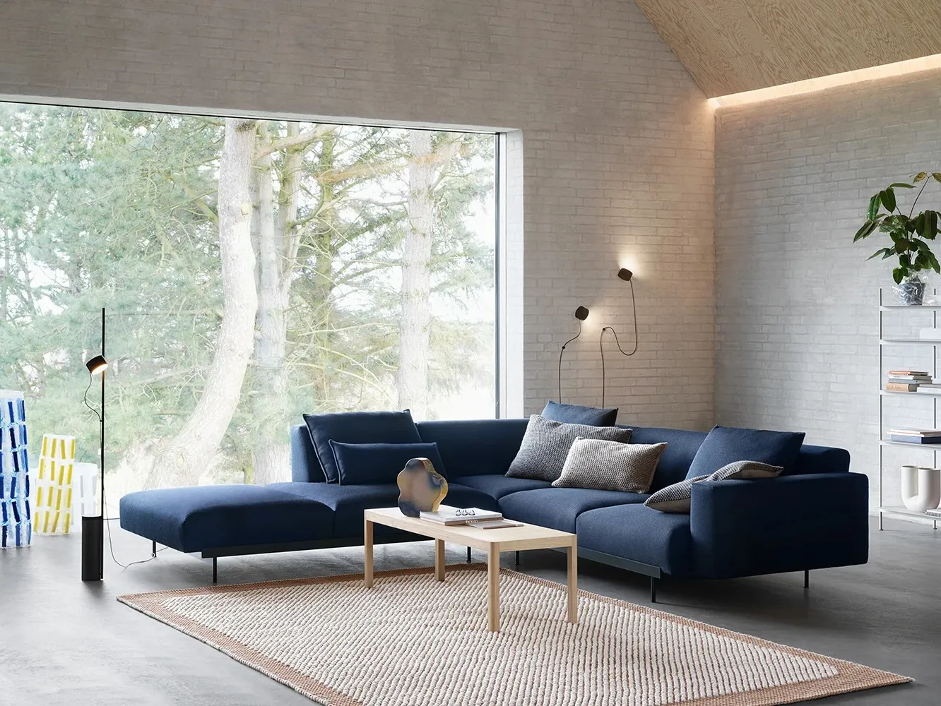Navy fabric upholstered corner sofa