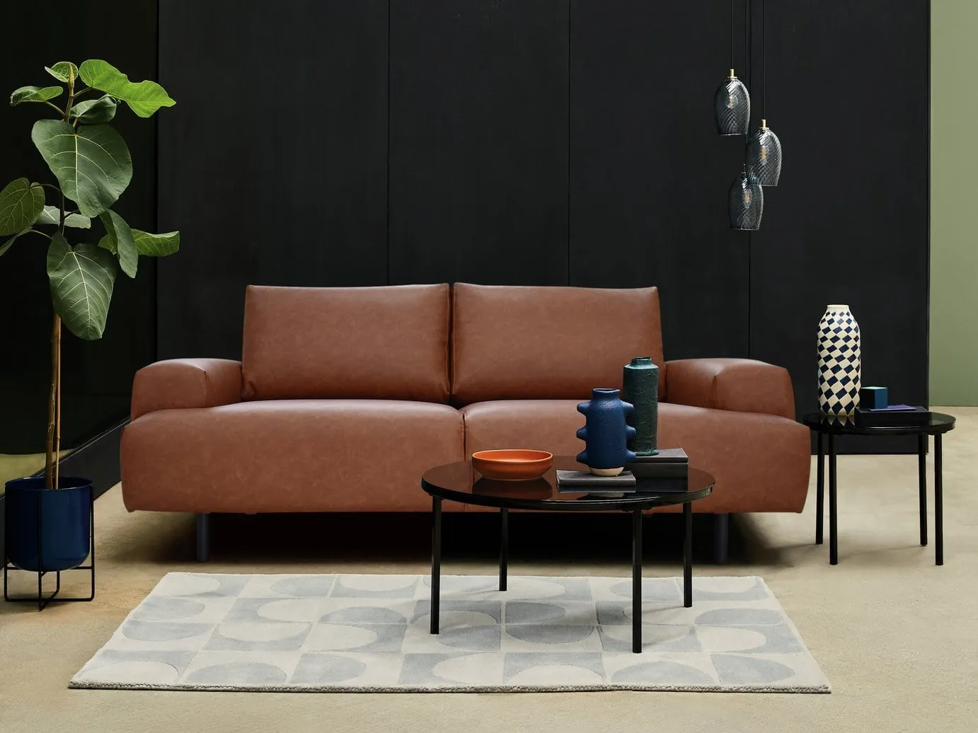 Brown faux leather sofa