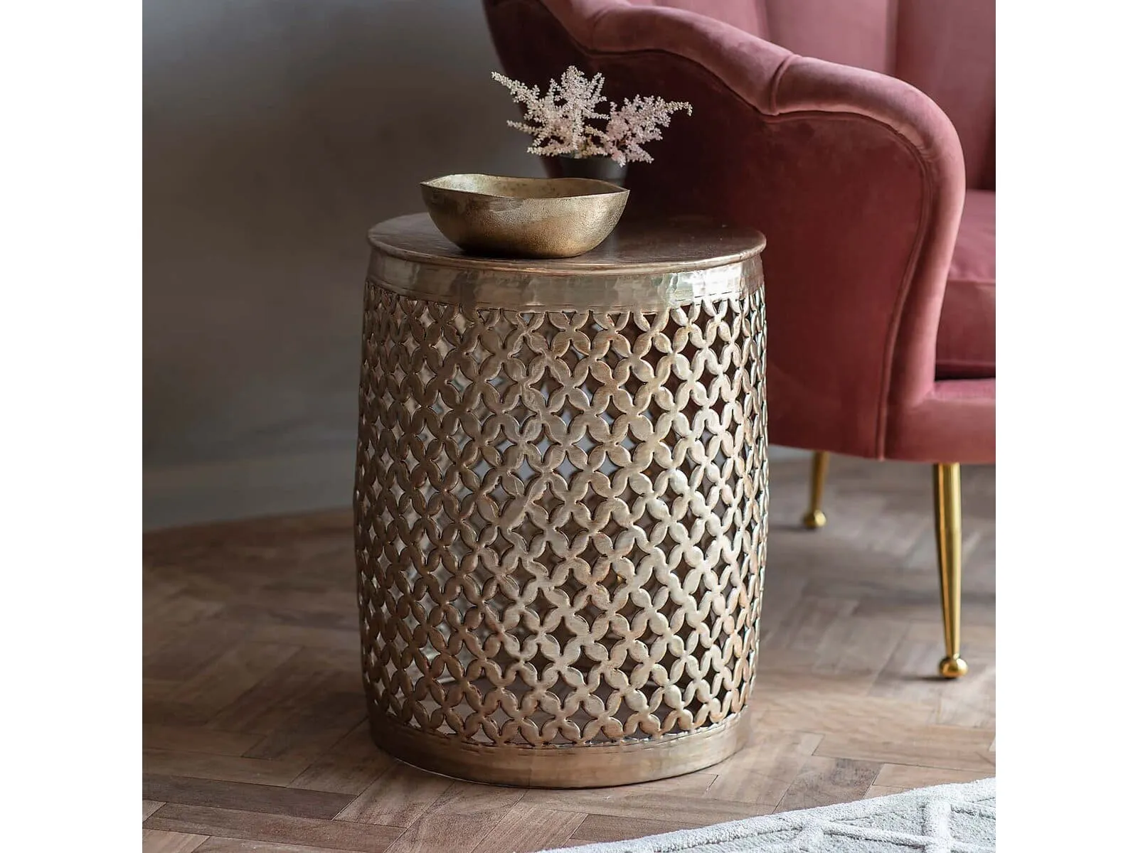 Round metal side table with hammered finish