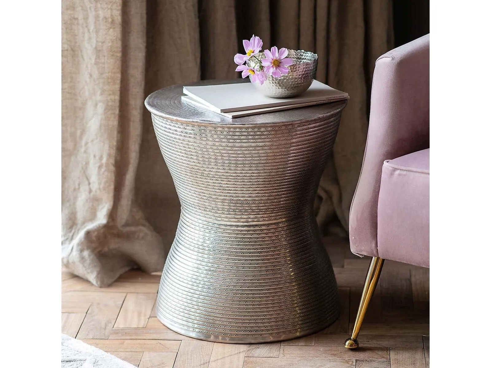 Round metal table with antique silver hammered finish