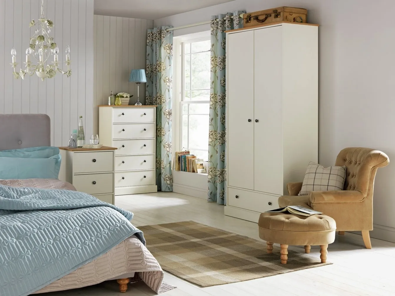 Ivory coloured bedroom furniture with an oak trim
