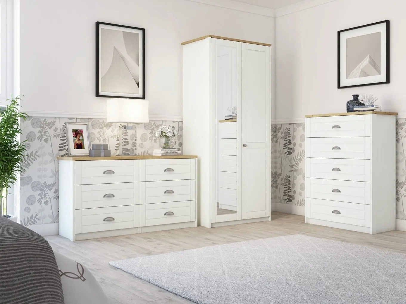 Light-grey bedroom furniture with silver cup handles and oak trim