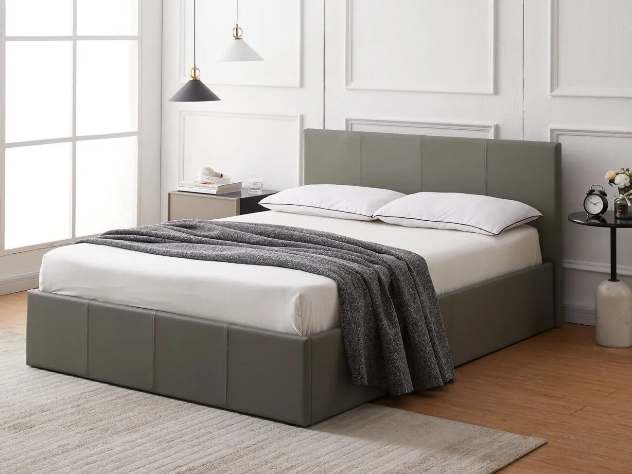 Grey faux leather bed frame with lift-up storage base]