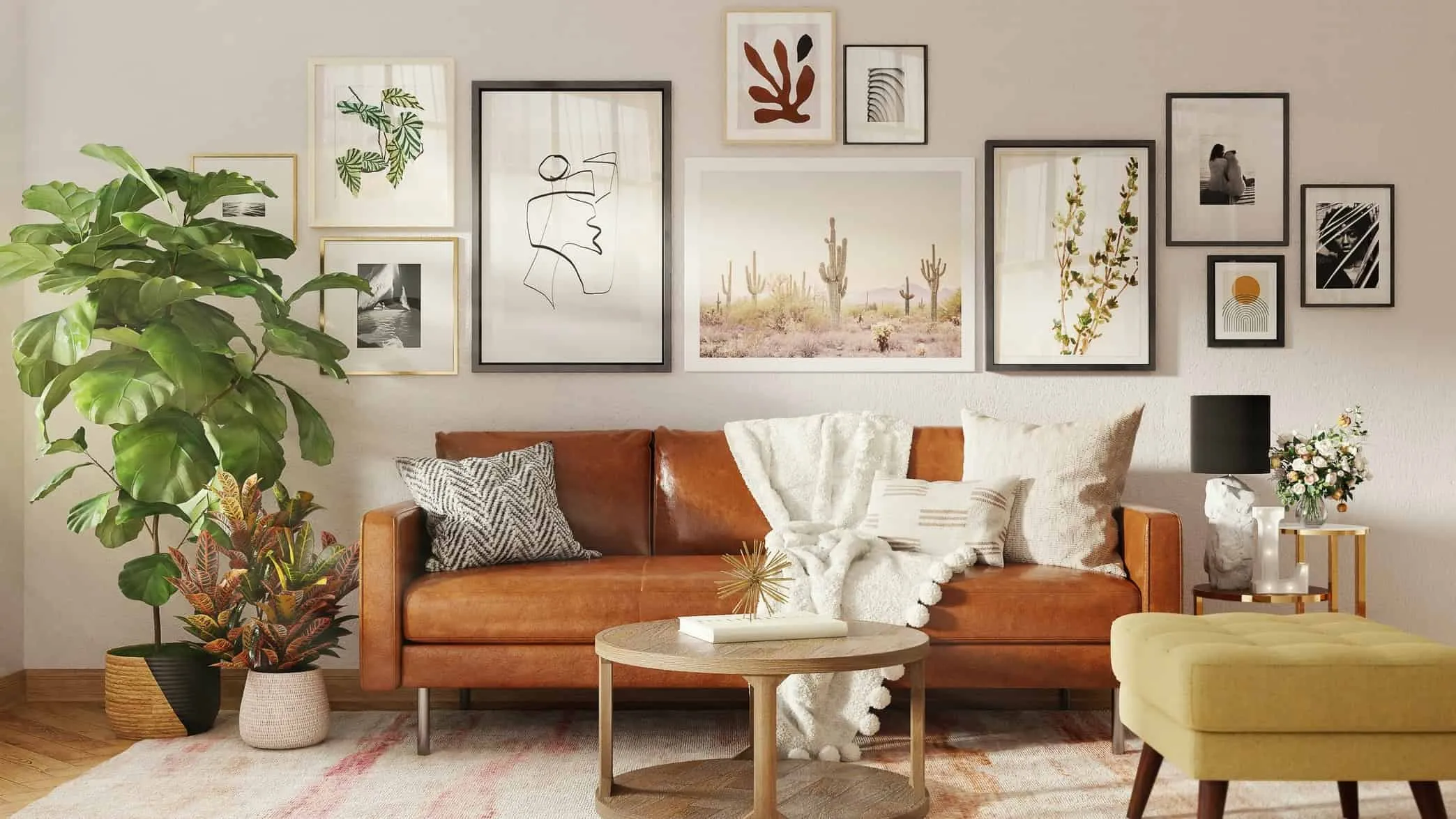 A well designed living room featuring a leather sofa and lots of pictures