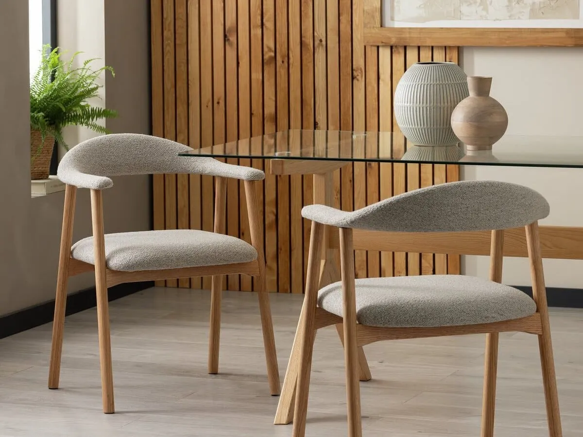 Contemporary oak dining chairs with natural fabric upholstery