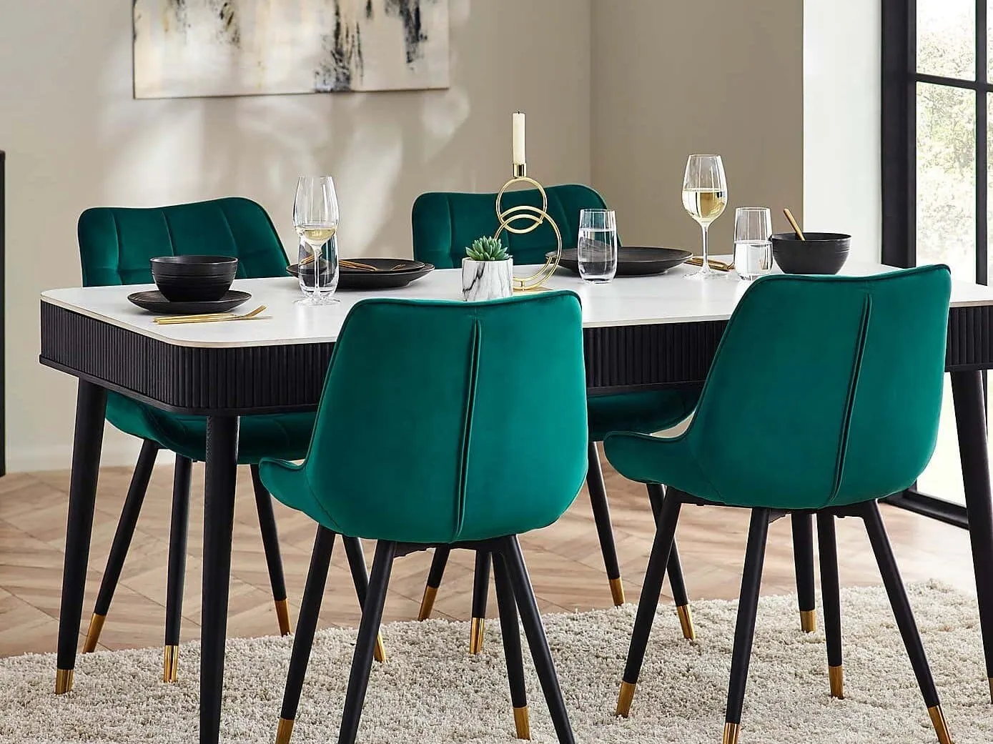 Black dining table with white stone top