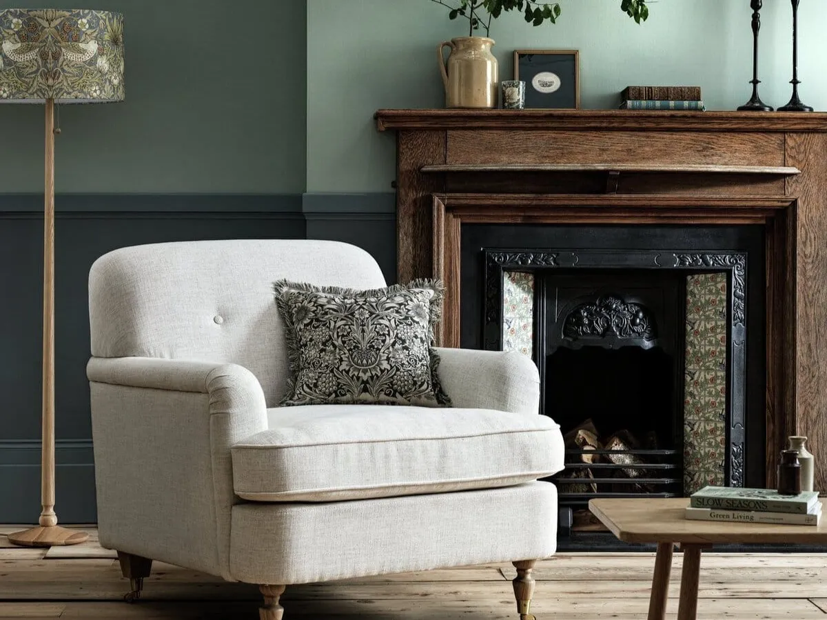 Cream fabric upholstered armchair