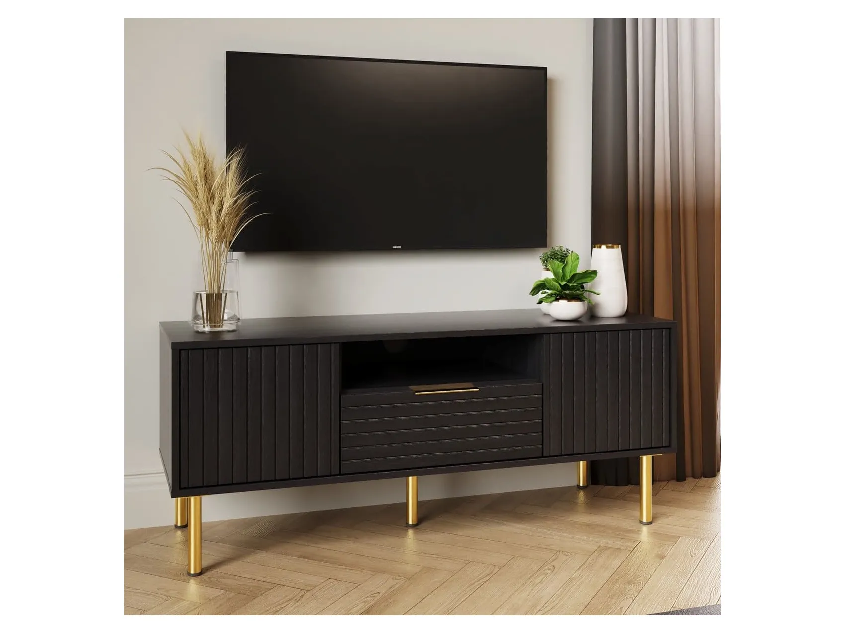 Black TV unit with gold-coloured legs