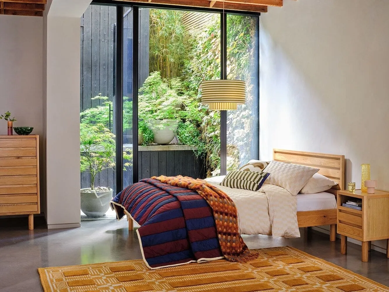 Contemporary oak bed frame with slatted headboard